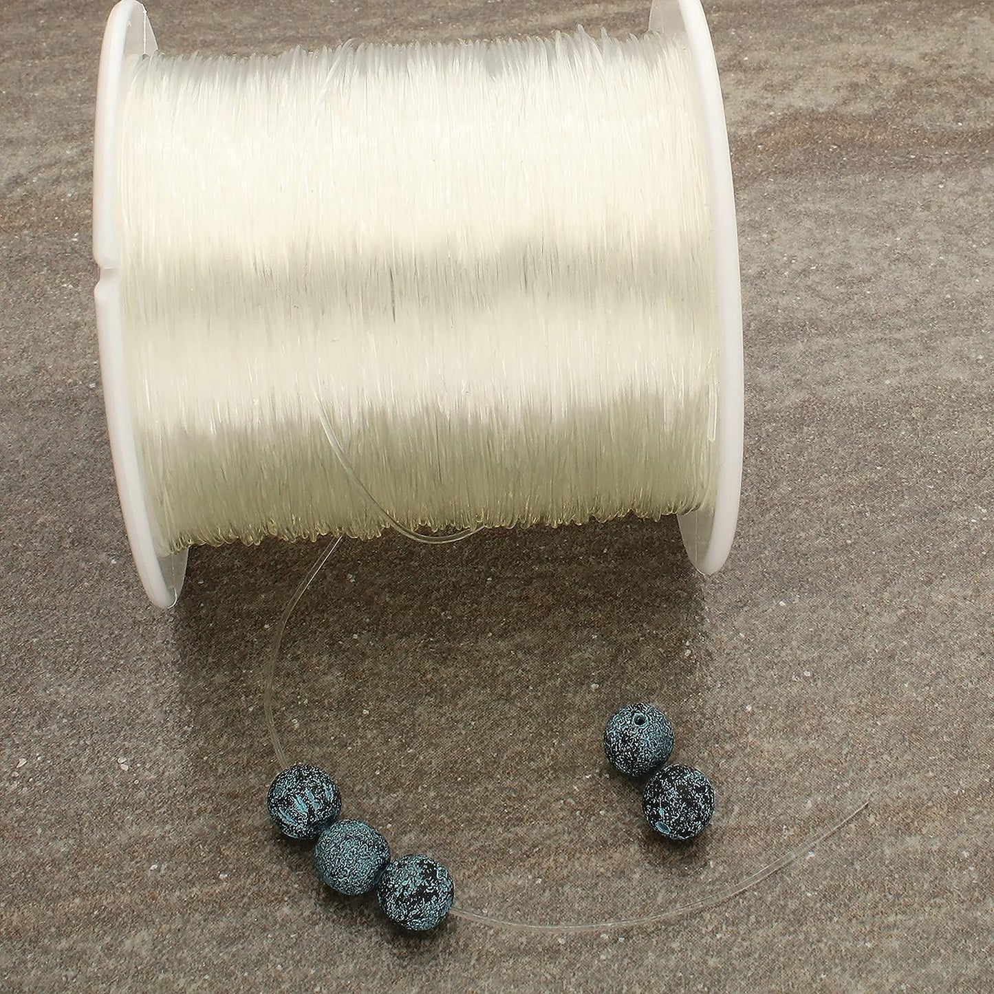 Stretch Magic Bead & Jewelry Cord - Strong & Stretchy, Easy to Knot - Clear Color - 0.7mm diameter - 100-meter (328 ft) spool - Elastic String for making beaded jewelry