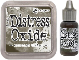 Bundle Tim Holtz Distress January 2024 Scorched Timber Oxide Ink Pad and Reinker Bundle Ranger Oxide Ink pad (TDO83467) and its reinker (TDR83474).