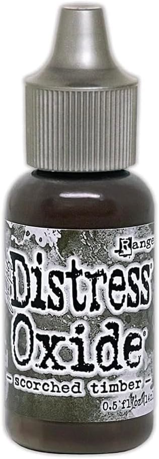 Bundle Tim Holtz Distress January 2024 Scorched Timber Oxide Ink Pad and Reinker Bundle Ranger Oxide Ink pad (TDO83467) and its reinker (TDR83474).