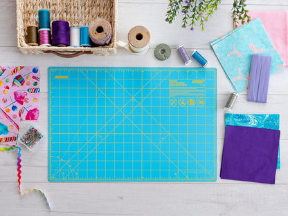 OLFA 12" x 18" Self Healing Rotary Cutting Mat (RM-CG/AQA) - Double Sided 12x18 Inch Cutting Mat with Grid for Fabric, Sewing, Quilting, & Crafts, Designed for Use with Rotary Cutters (Aqua)